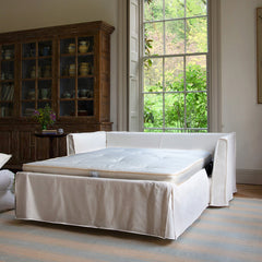 Coco 2.5 seater sofa bed with Self Piped Knife Edge cushion in Cotton Linen White Camellia - Made to Order